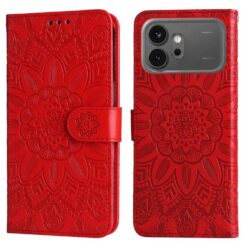 Red wallet-style phone case with an intricate embossed mandala floral pattern, shown from front and back with a magnetic strap.