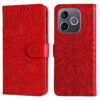 Red wallet-style phone case with an intricate floral mandala embossing, shown from front and back views, with a magnetic strap. | Levné Kryty