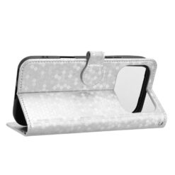 Silver phone case with a hexagonal pattern, folded to act as a stand, featuring a built-in rear mirror window.